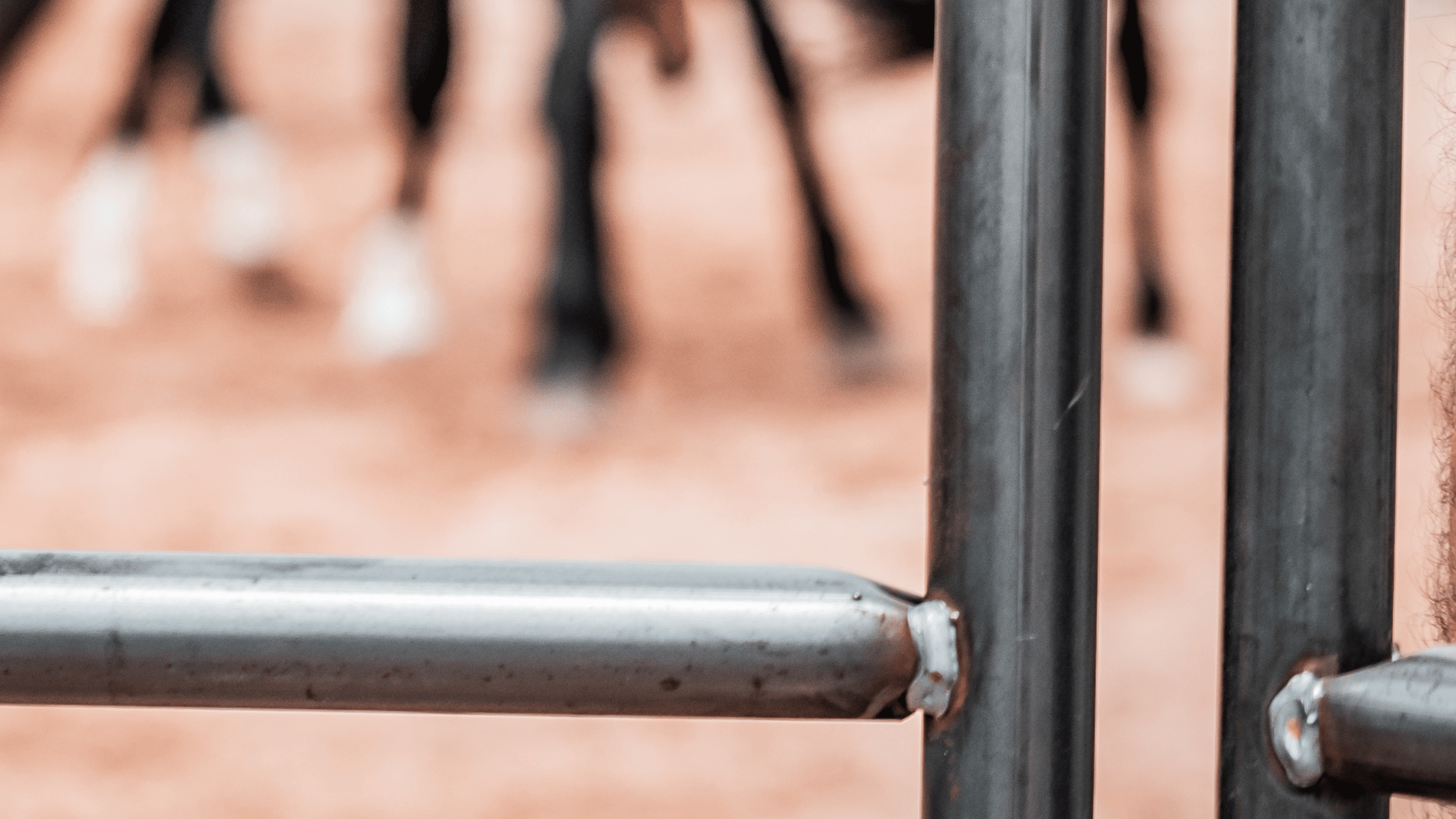 Rust on steel post and rail fencing