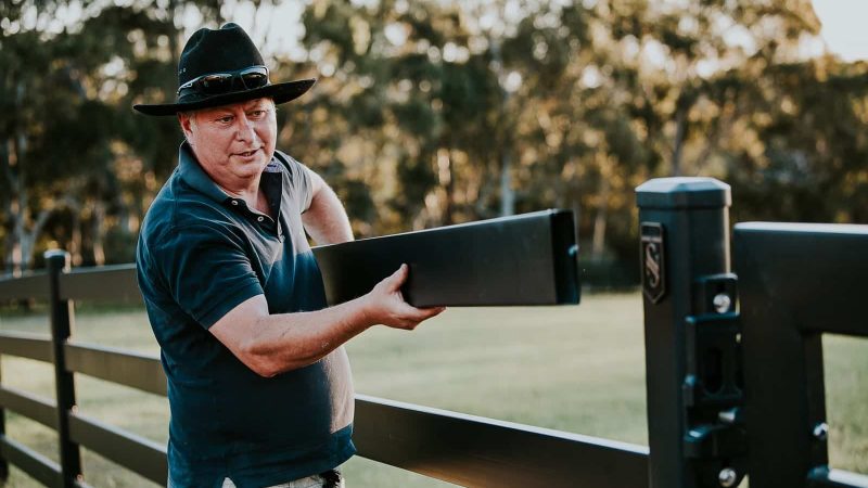 Premium steel post and rail fence by Stock & Noble